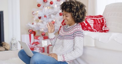 woman sitting by the christmas tree