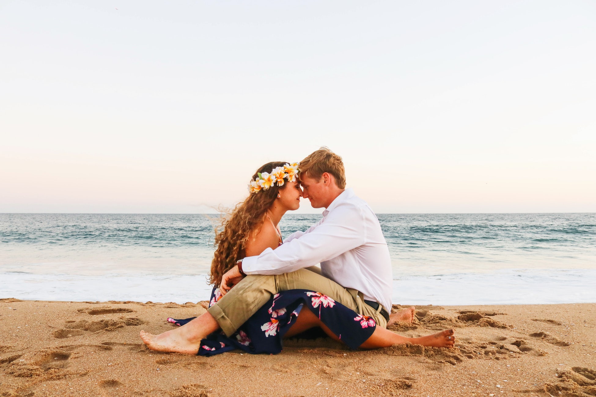 Shot of couple in embrace on beach