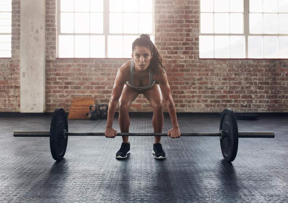 woman training with weights