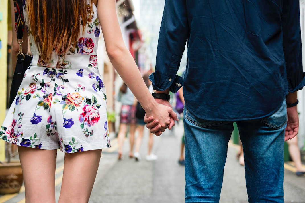 Couple holding hands. Photo by rawpixel.com from Pexels