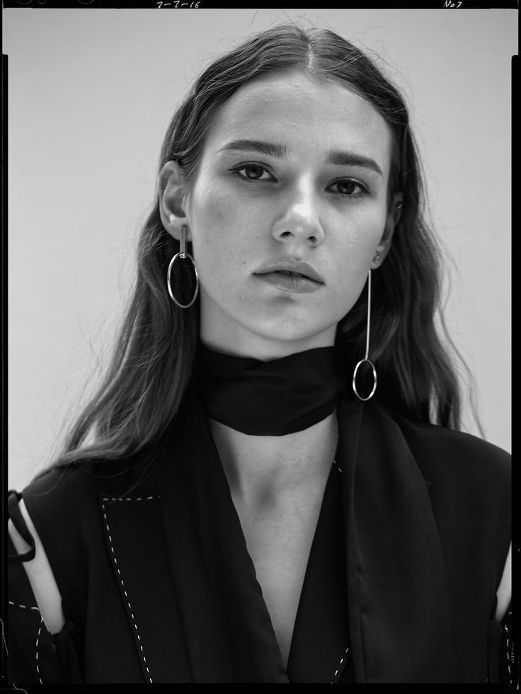 Girl with mismatched earrings.
