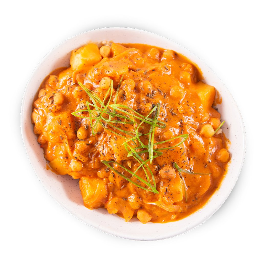 Afrikaan peanut stew on white plate