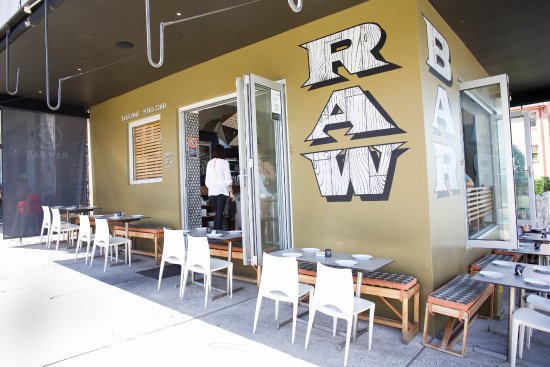 Raw Bar Bondi with white chairs outside