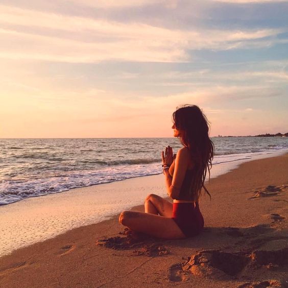 Girl sitting on beach