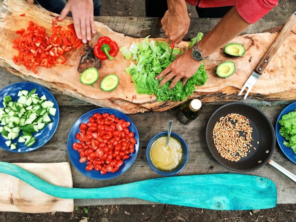 food and vegetables prepped and ready for cooking in a kitchen