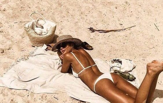 Girl lying on sand