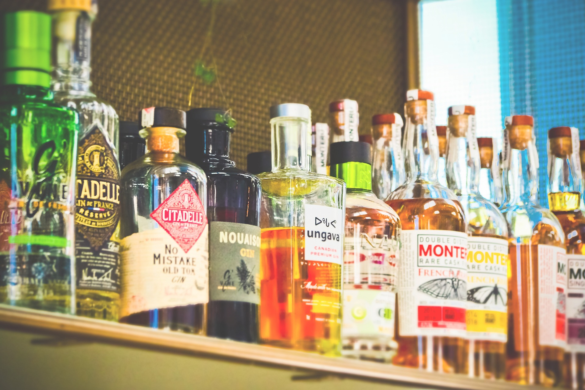Alcohol bottles on a shelf.