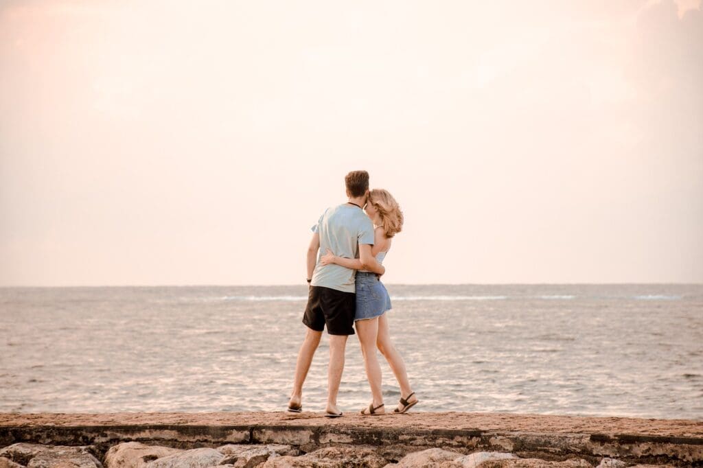 couple in front of the ocean
