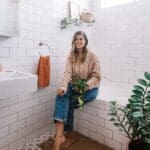 Geneva Vanderzeil with her indoor plants