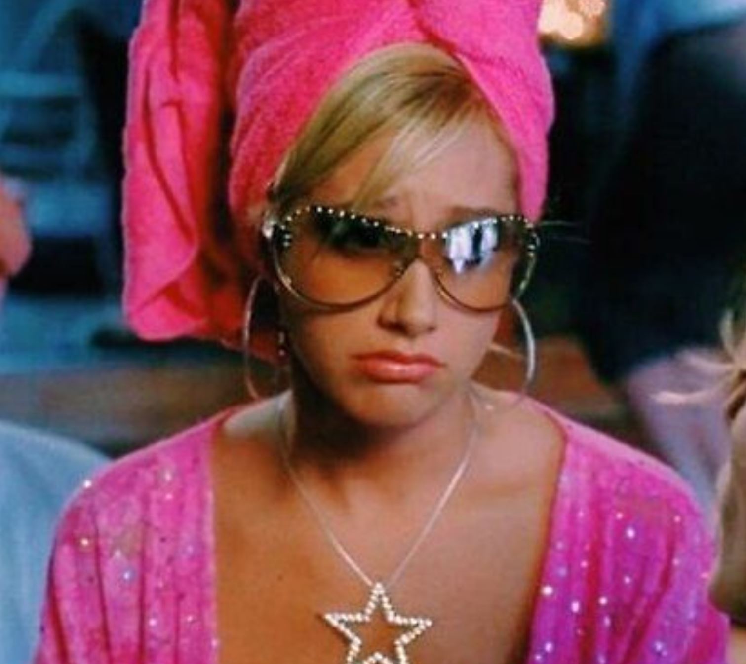 Sharpay from High School Musical looking sad, disappointed and lonely. Pink towel wrap and pink dressing gown with a star necklace.