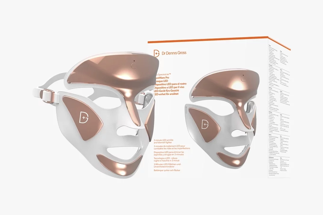 DRx SpectraLite™ FaceWare Pro - Dr. Dennis Gross Skincare. led face masks with rose gold detailing on the forehead cheeks and chin.